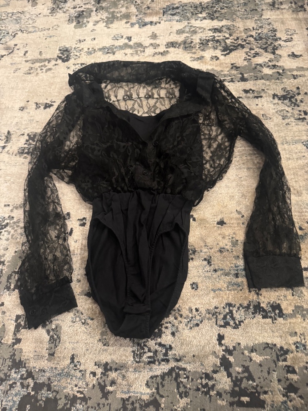 Ladies Black Lace Long-Sleeve Bodysuit size small.